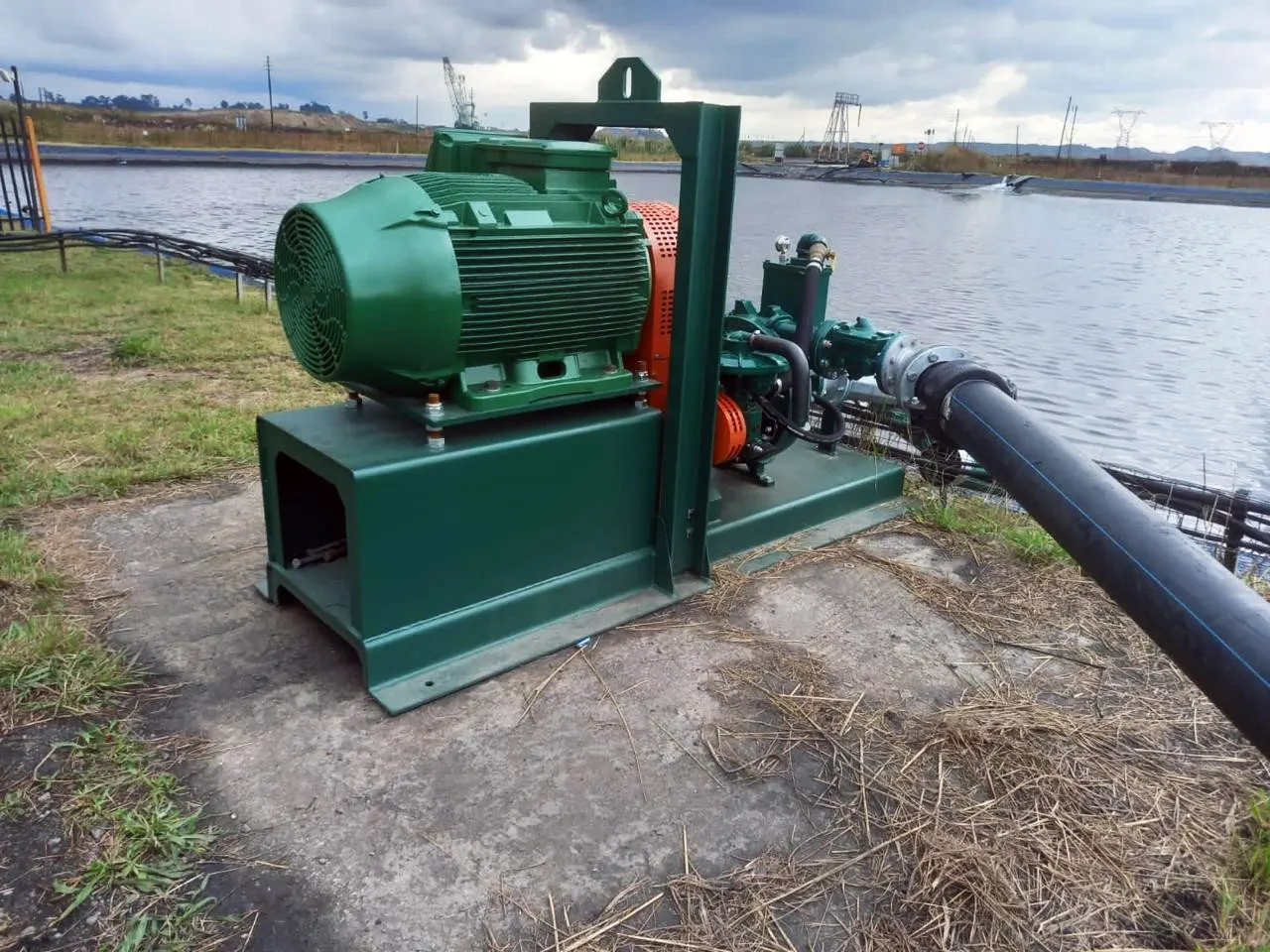 Pump skid installed beside a water dam